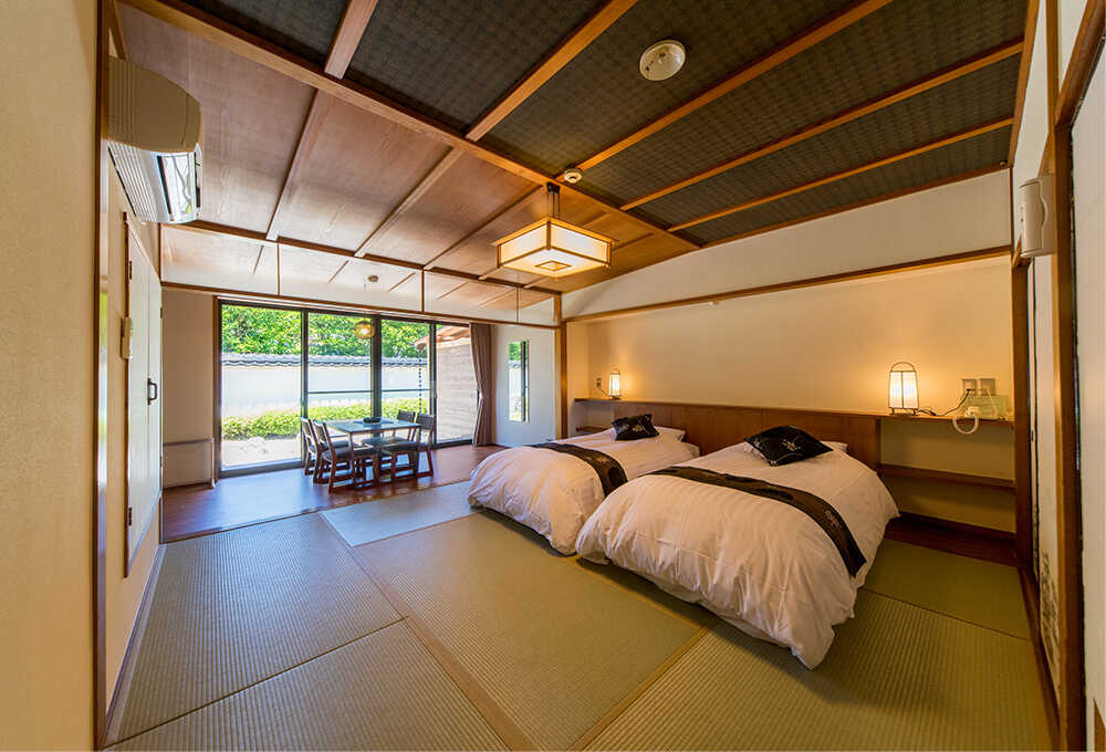 Guest room with an open-air hot spring bath